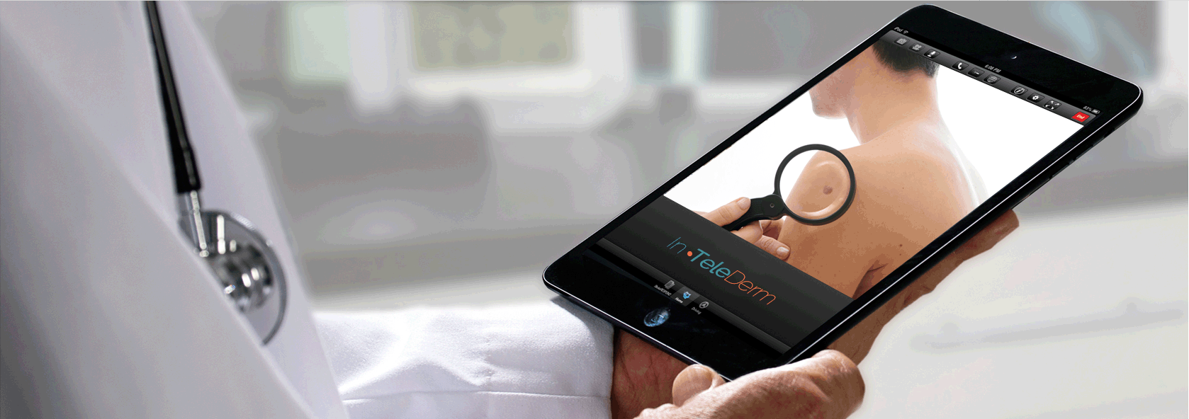 A clinician reviewing a patient's skin concern on a tablet